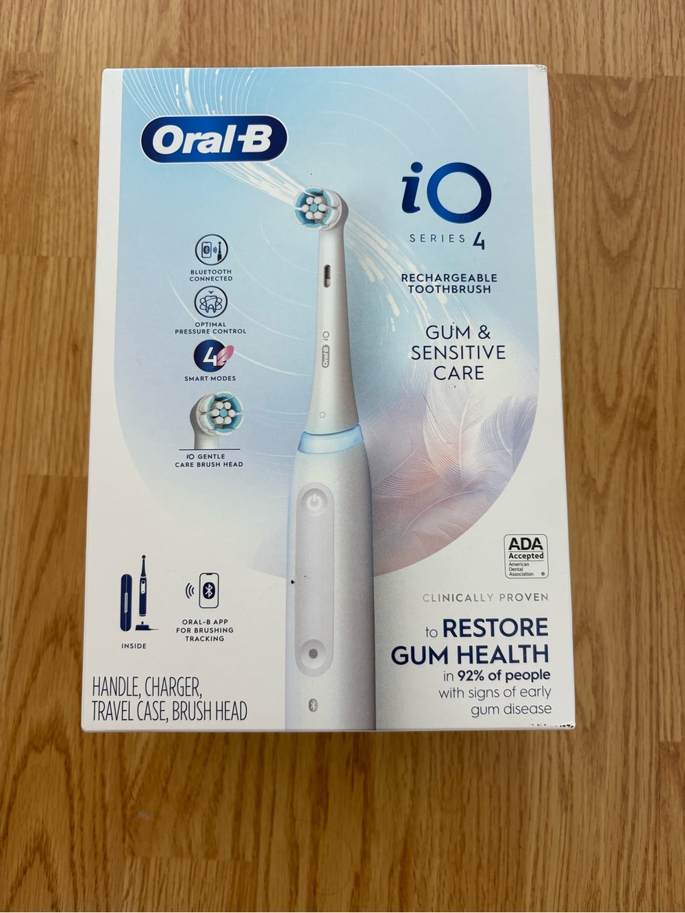 iO Series 4 Oral B Rechargeable Electric Toothbrush - White/Blue
